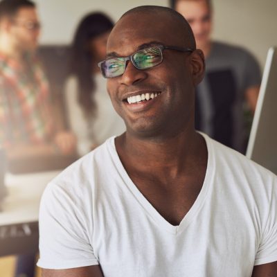 African American businessman smiling in the office